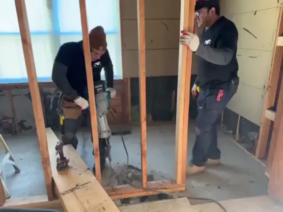 Workers drill in the floor 1